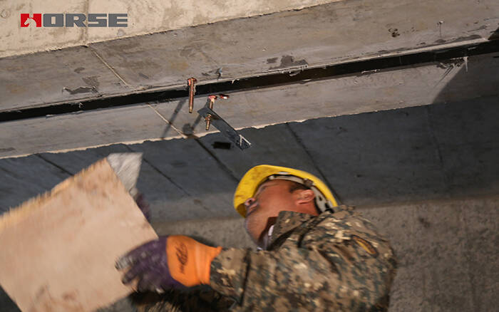 Strengthening by prestressed CFRP plate Strengthening by prestressed CFRP plate