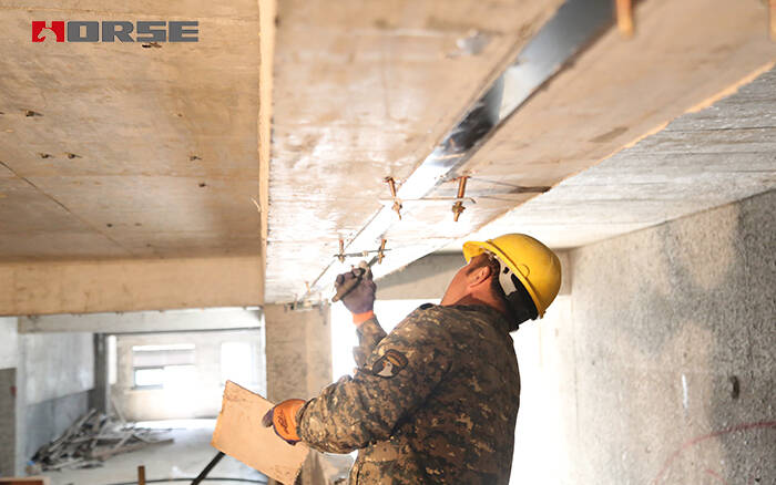 Strengthening by prestressed CFRP plate Strengthening by prestressed CFRP plate