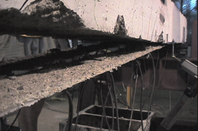 Peeling failure in concrete strengthened with CFRP Peeling failure in concrete strengthened with CFRP